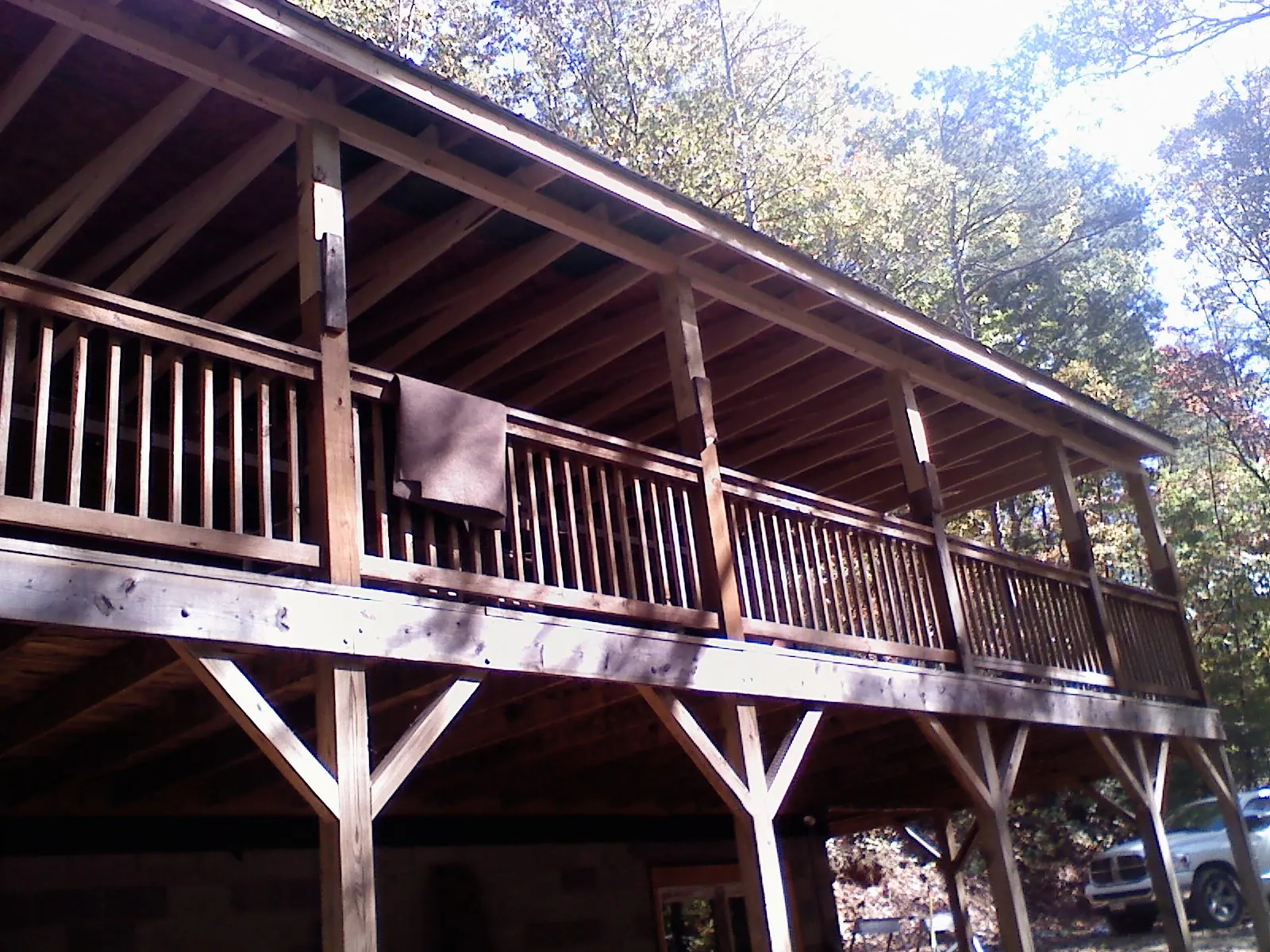 Timber framing under a new elevated porch and deck — Roof Leak Repair in Ryegate by Roofing Brothers